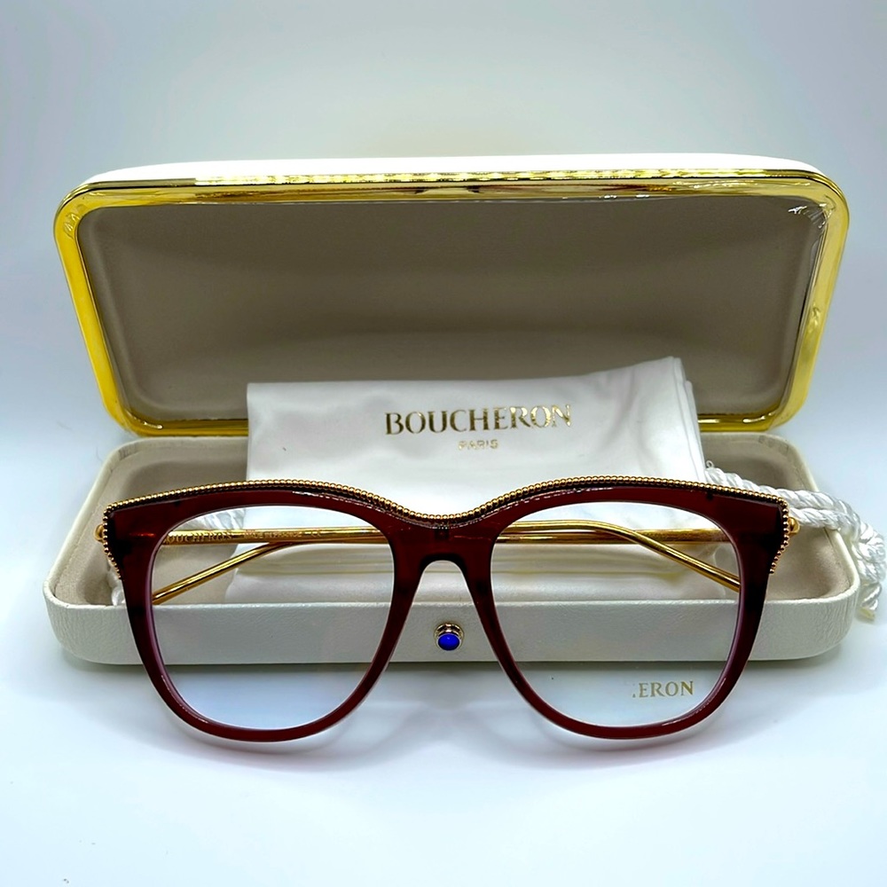 NWOT. Boucheron Optical lenses. Plum and gold. Plum frames with gold accents.
